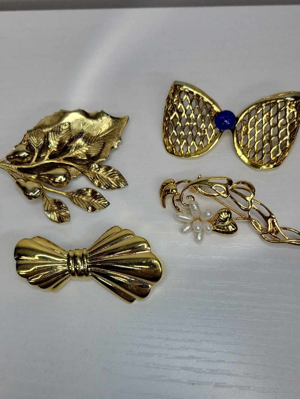 Gold Tone Decorative Brooch Set